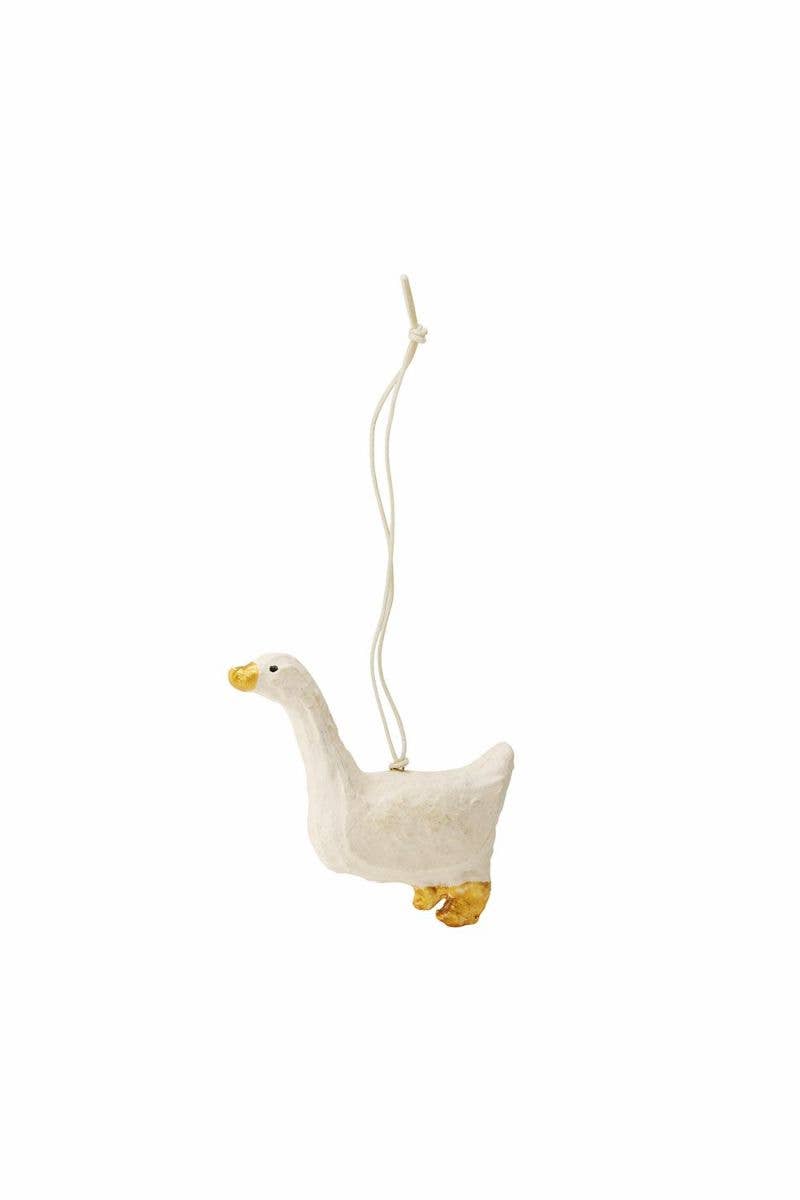 White goose ornament hanging on a white background