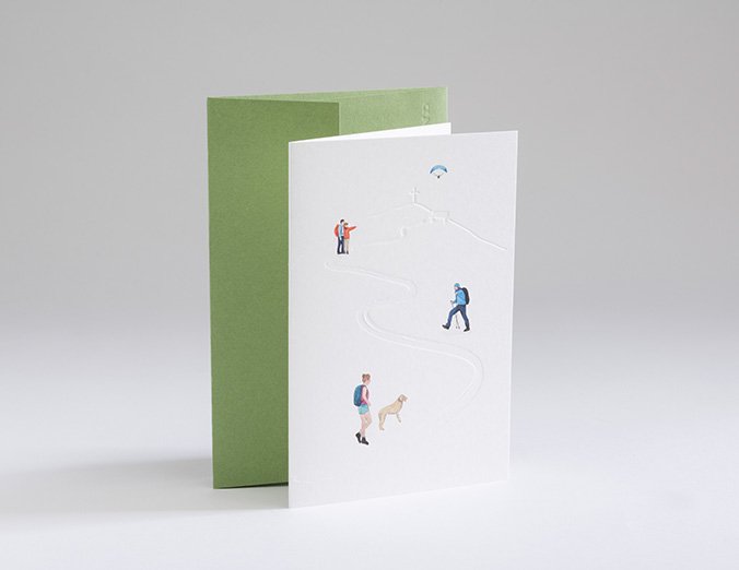Greeting card with illustrations of people and a dog on a white background