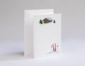 Greeting card with a cabin and skis design on a white background