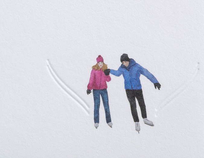 Two people ice skating on a frozen lake.