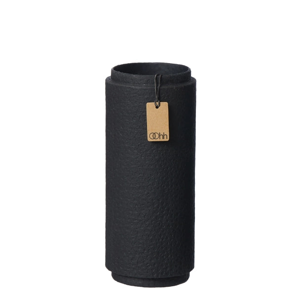 Black cylindrical vase with a brown tag on a white background