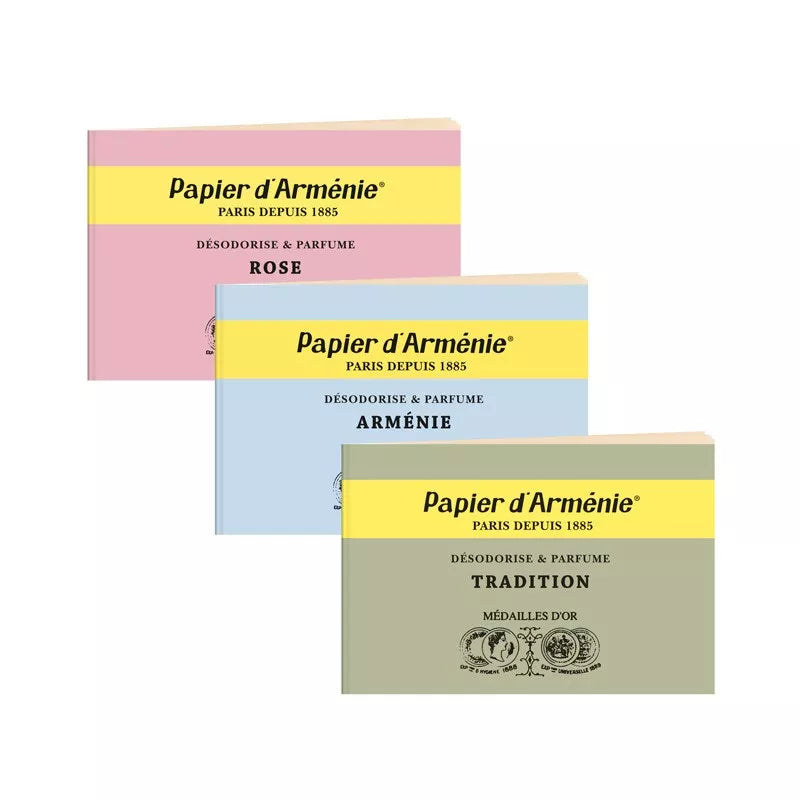 Three boxes of Papier d'Arménie with different colored labels on a white background.
